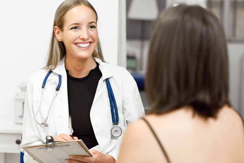 woman talking with doctor